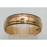 A Vintage 9K Yellow Gold Band. Size P 1/2. 2.61g.