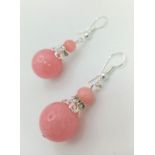 A Pair of Pink Jade Graduated Ball Drop Earrings. 3cm drop. Largest ball - 14mm.
