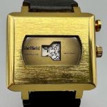 A Rare Sheffield Instalite Jump Watch. Black leather strap. Gold plated case - 36mm. Mechanical