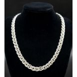 An Intricate Circular 925 Silver Link Necklace. 42cm. 51g total weight.