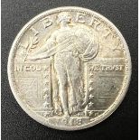 A 1918 USA Standing Liberty Quarter Dollar Silver Coin.