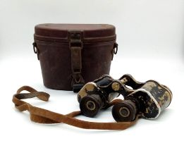 A Pair of WW2 German Swarovski Made 6x30 Binoculars. The binoculars with manufacture coding to the