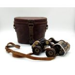 A Pair of WW2 German Swarovski Made 6x30 Binoculars. The binoculars with manufacture coding to the