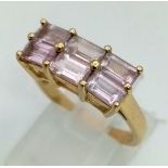 9K YELLOW GOLD 6 PINK STONE RING. TOTAL WEIGHT 3G. SIZE N