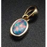 An 18 K white gold , opal set pendant. weight: 0.8 g.