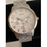 Gentlemans GUESS Quartz wristwatch, Multi- dial model in silver tone, having large circular white