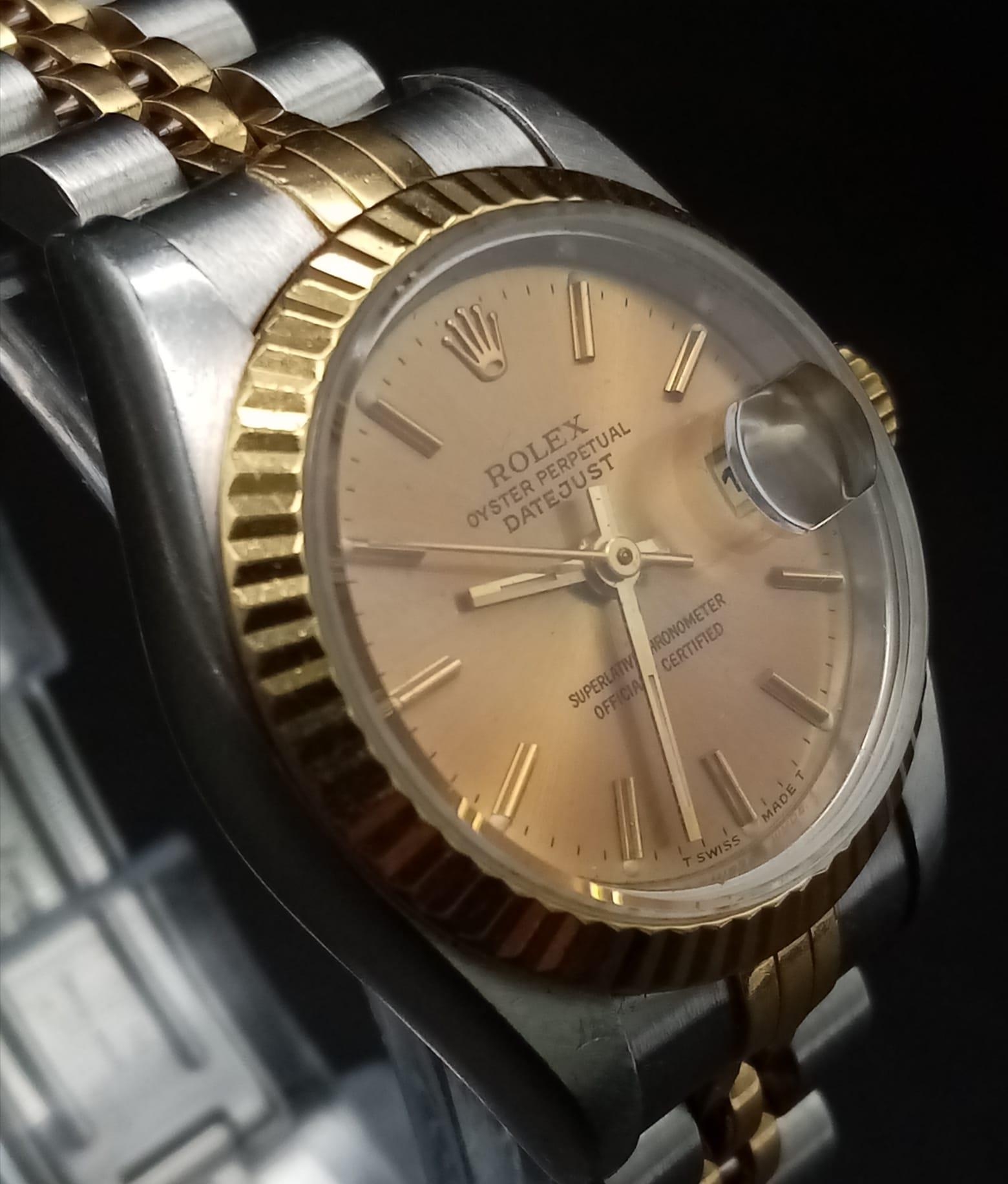 A Rolex Oyster Perpetual Datejust Ladies Watch. Bi-metal strap and case - 26mm. Gold tone dial - Image 4 of 13