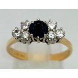 18k Gold Diamond and Blue Sapphire Ring. Total Weight 3.27grams. Size O.