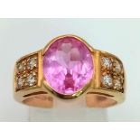 A 9K Yellow Gold Pink Topaz and White Stone Ring. Size M. 4.43g