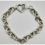 TIFFANY & CO STERLING SILVER ARROW HEART TOGGLE LINK BRACELET 35.4G. Length: 22.5cm