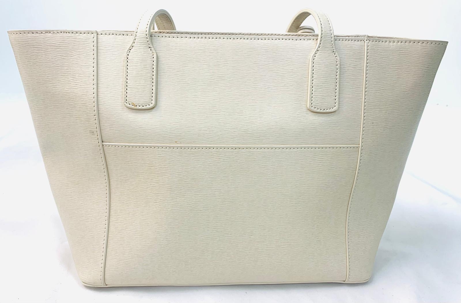 A Ralph Lauren Cream Leather Handbag. Two exterior flaps. Zipped inner compartment. 36cm width. 26cm - Image 4 of 12