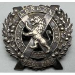 WW1 British London Scottish Regiment Silver Cap Badge. The badge depicting a Lion in a St. Andrews