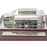 A Limited Edition Arsenal FC Aquascutum Highbury Stadium Model. A silver-toned metal model