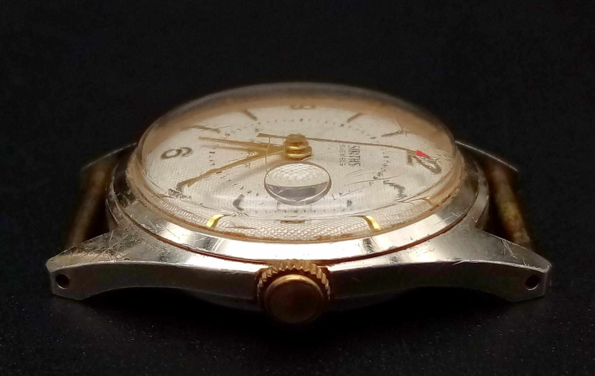 A Vintage Smiths 5 Jewels Watch Case - 34mm. White dial with date window. Mechanical movement in - Image 4 of 4