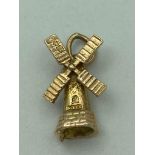 9 carat GOLD WINDMILL CHARM having full UK Hallmark. 1.27 grams.