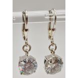 A Pair of White Diamond (laboratory) Drop Earrings Set in 925 Silver. 4ct diamond total approx.