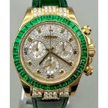 A Very Bling Rolex Cosmograph 18K Gold, Emerald and Diamond Watch. Green leather strap and Rolex
