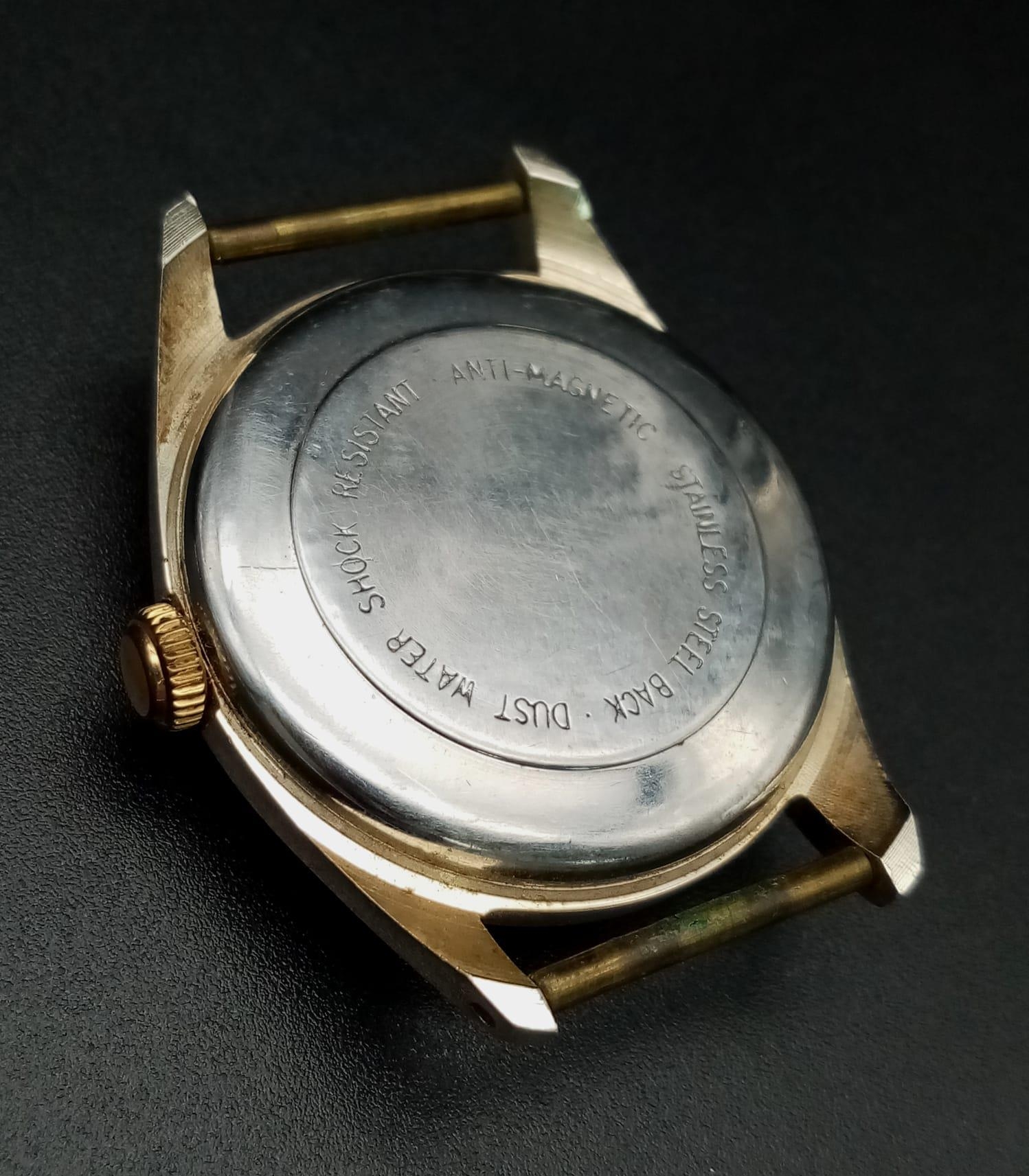 A Vintage Smiths 5 Jewels Watch Case - 34mm. White dial with date window. Mechanical movement in - Image 3 of 4