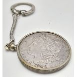 A USA 1900 Silver Morgan Dollar Key-ring Fob. 34.24g. Good definition on the coin but please see