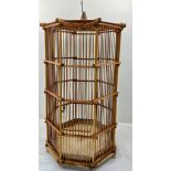 A VERY RARE ANTIQUE CHINESE BAMBOO BIRD CAGE FROM THE LATE 1800'S . HIGH HEXAGONAL DESIGN AND IN