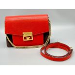 A Givenchy GV3 Red Leather and Suede Shoulder Bag. Gilded hardware and shoulder chain. Multi-
