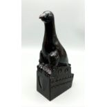 An Ebony Wood Sculpture from the Classic Gibbs Collection. 21cm tall