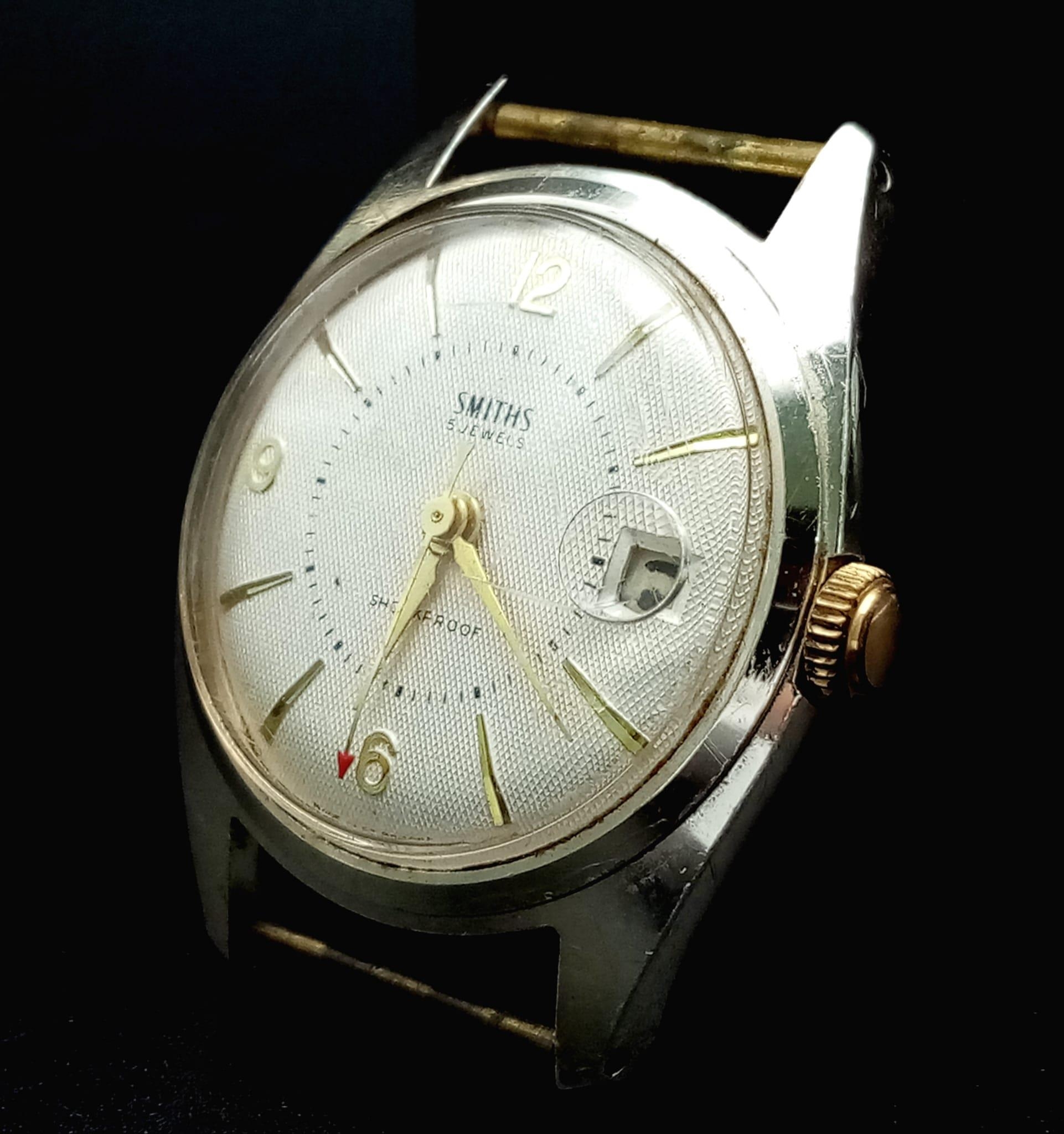A Vintage Smiths 5 Jewels Watch Case - 34mm. White dial with date window. Mechanical movement in - Image 2 of 4
