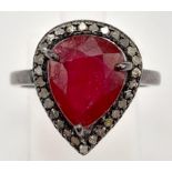 A 5ct Antique-Style Pear Cut Ruby Gemstone Ring Set in 925 Silver - with 0.27ct of Diamond Surround.