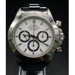 A Rolex Daytona Cosmograph Gents Watch. Stainless steel strap and case - 40mm. White dial with three