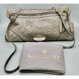 A Mulberry Taylor Satchel Bag. Grey calfskin leather with oval silver tone Mulberry badge. Zipped