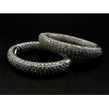 A Pair of Elaborate 18K White Gold and Diamond Hoop Earrings. With over 500 VVS1 quality white