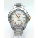 A Tag Heuer Automatic Aquaracer Ladies Watch. Stainless steel strap and case - 32mm. White dial with