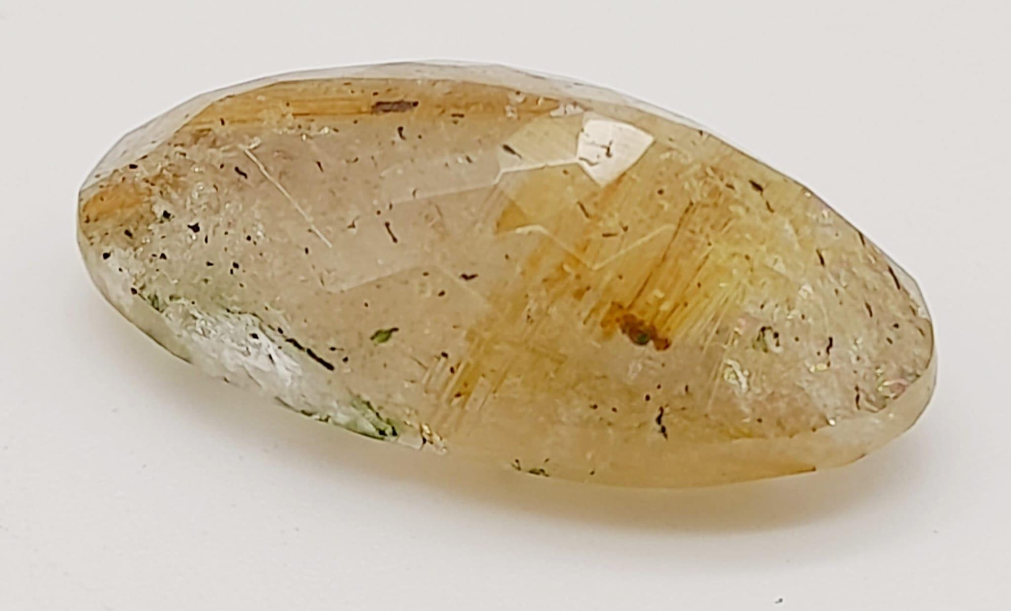 A 13.10ct Natural Rutile Quartz, in an Oval Shape cut. Come with the GLI Certificate - Image 3 of 8