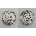 An 1889 Queen Victoria Silver Crown. Good definition but please see photos.