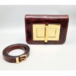 A Tom Ford Brown Croc Embossed Leather Natalia Handbag. Huge gold-tone Tom Ford turn-lock clasp.