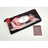 A Patent Leather Mulberry Zip Pouch in a Scribbled Floral Pattern. Silver-nickel toned hardware.