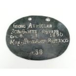 WW1 Imperial German Dog Tag to a Corporal in the Foot Artillery Battalion.