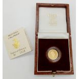 A Royal Mint 1989 Britannia 1/10oz 22K Gold Coin. This limited edition proof coin (No. 1212) comes