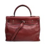 A Hermes Kelly Brown Leather Handbag. Simple elegance with the softest of leather and buckle design.