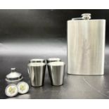 An SAS engraved (WHO DARES WINS) white metal hip flask with four cups and filling funnel in original