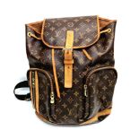 A Louis Vuitton Backpack. Monogram brown canvas. Leather trim. Zipped exterior pockets. Thick