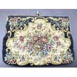 A Vintage French Tapestry Purse. 19 x 14cm. Fair condition.