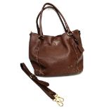 A Prada Brown Leather Tote Bag. Gilded hardware. Spacious interior. Yes, its seen better days (see