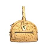 A Gucci Vintage Ostrich Brown Leather Bag. Detachable shoulder strap. Front zip compartment. Turn