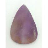 A 52.85 Ct Unpolished, Natural Amethyst, in a Pear Cabochon Shape. Comes with the GLI Certificate.