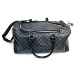 A Louis Vuitton Keepall Hand-Luggage Bag. Black checked leather. Leather handles and trim.