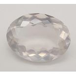 A 12.40ct Faceted Natural Rose Quartz in an Oval Shape. Come with the GLI Certified