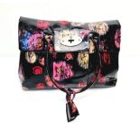 A Mulberry Classic Bayswater Patent Leather Handbag. Decorated with scribbly floral print.