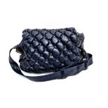 A Balanciaga Blue Leather Puff Bag. Adjustable handle. Quilted soft blue leather. Interior zip