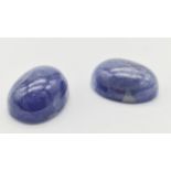 A Pair of Cabochon Tanzanite. 22.85cts in total.